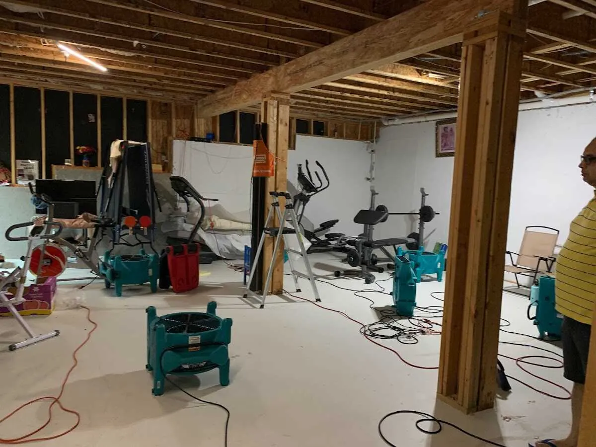 Basement drying equipment setup for Contents Cleaning & Restoration in Scottsburg